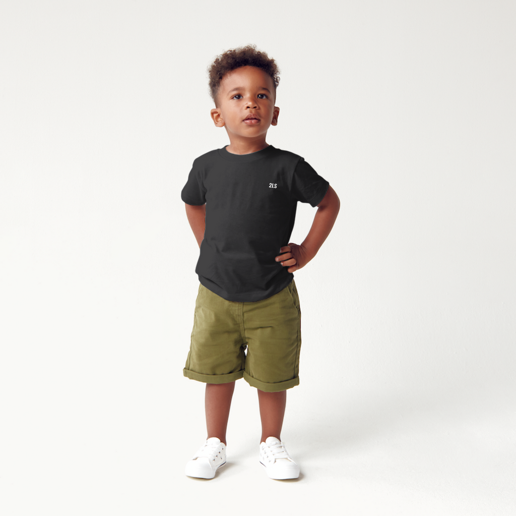 Child wearing a black 2lowsierra 2ls t-shirt and green shorts on a white background