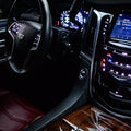GMC Sierra Denali Cadillac Escalade 2lowsierra lowrider truck show truck luxury truck houston tow install parts swap Car interior with dashboard and steering wheel in a dark setting